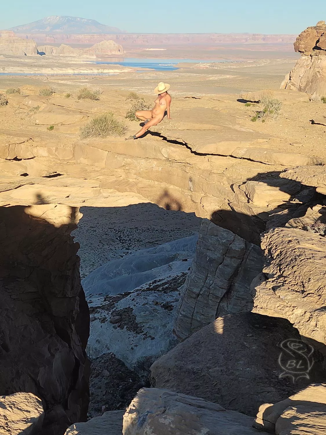 Perched atop Arizona's Skylight Arch 😶