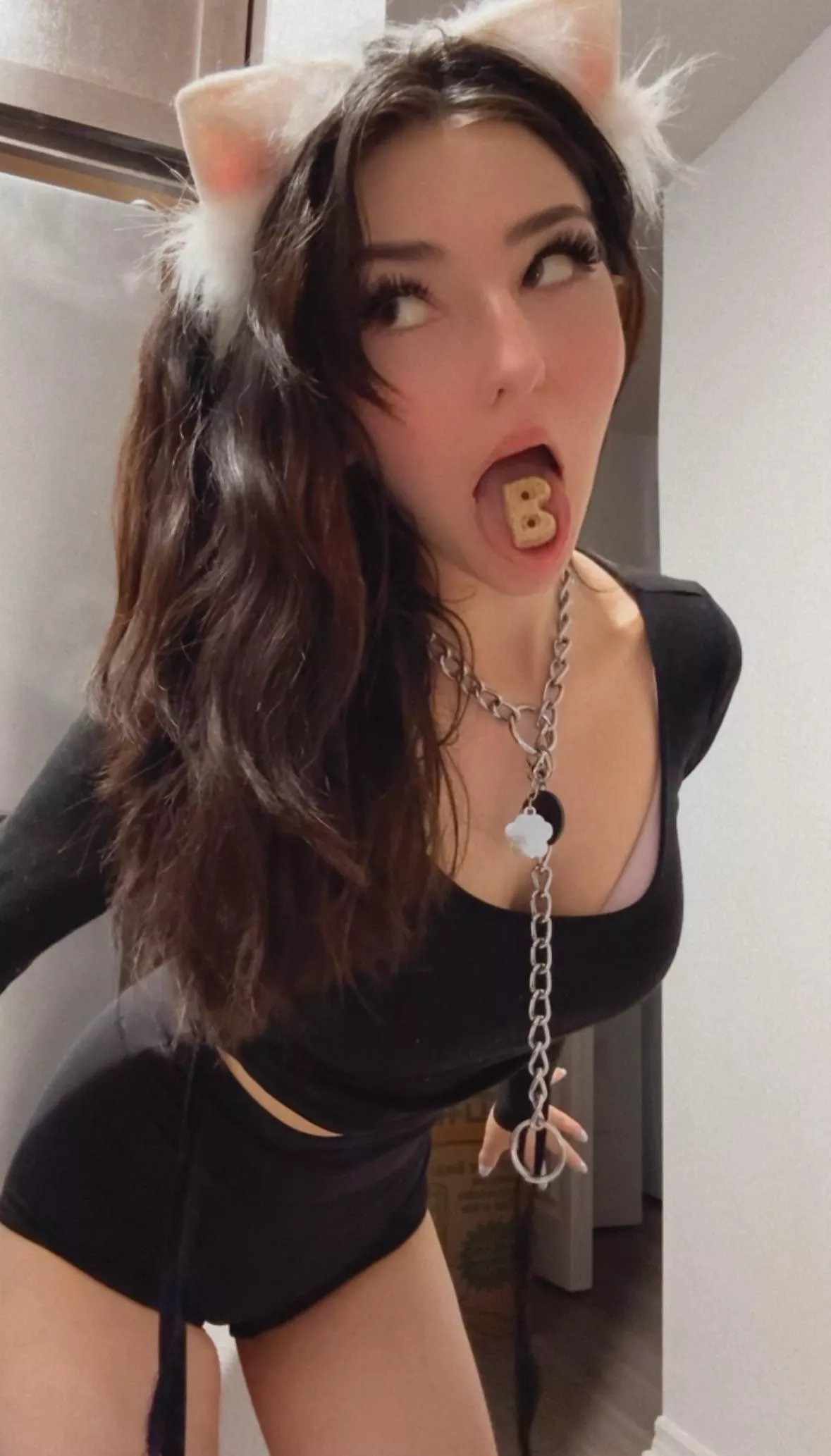 Puppy girl has a dog treat