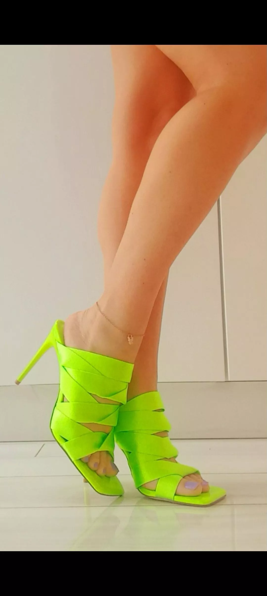 Florescent green heels with my purple toe polish. Hope it goes well? 