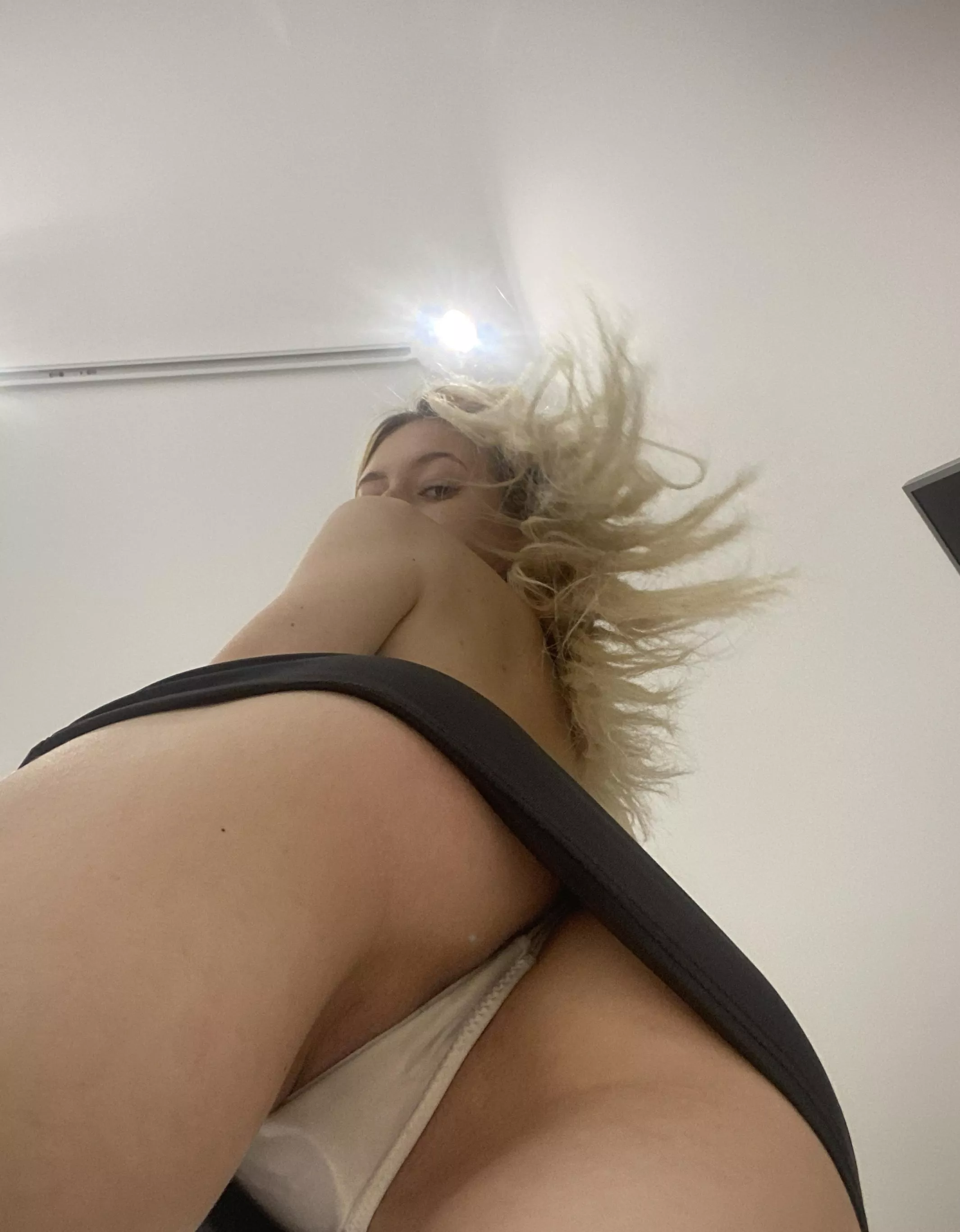 These white panties under the skirt are so inviting and enchanting