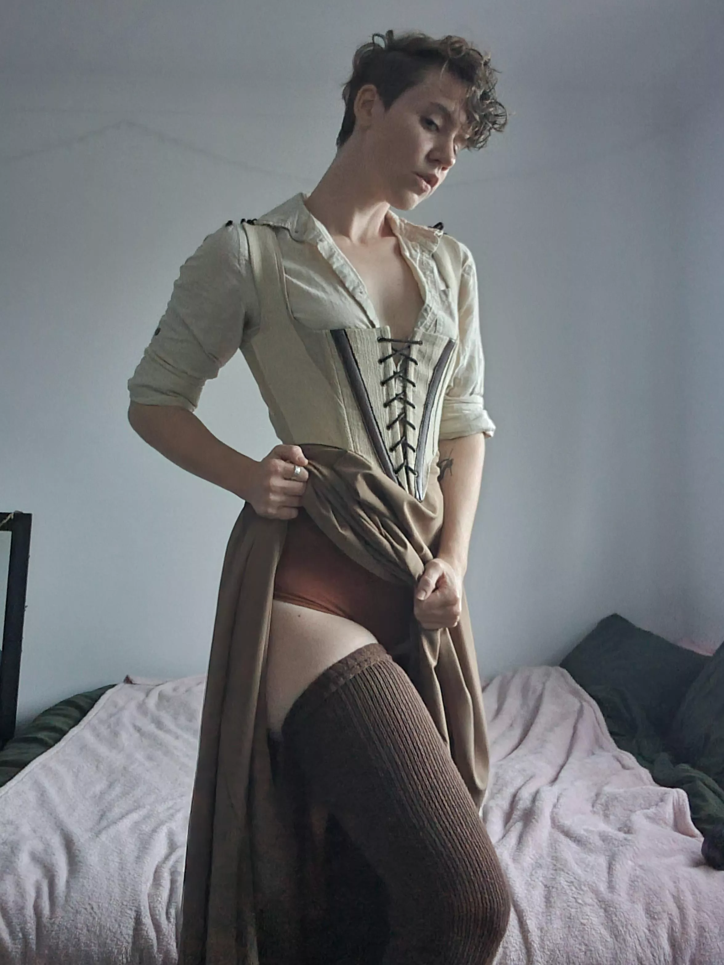 You meet at a tavern, and the barmaid is giving you the eyes. How does your character respond?