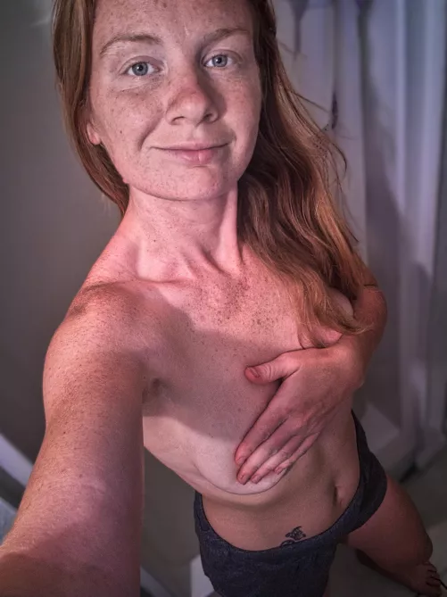 All natural, the carpet matches the drapes👙