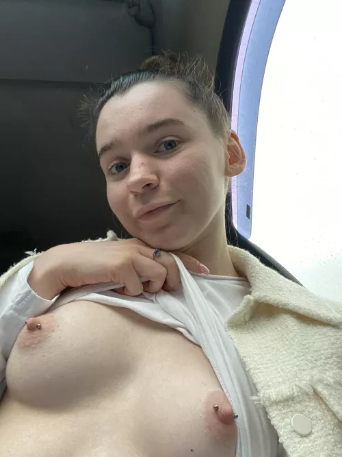 I like to show my breasts in the car