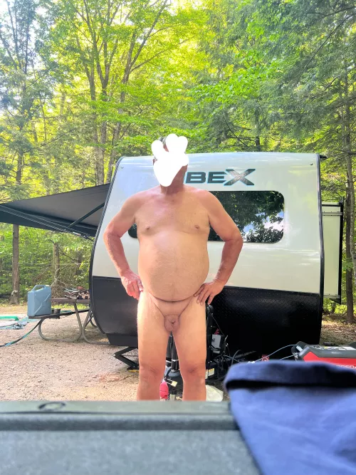 Naked in campsite