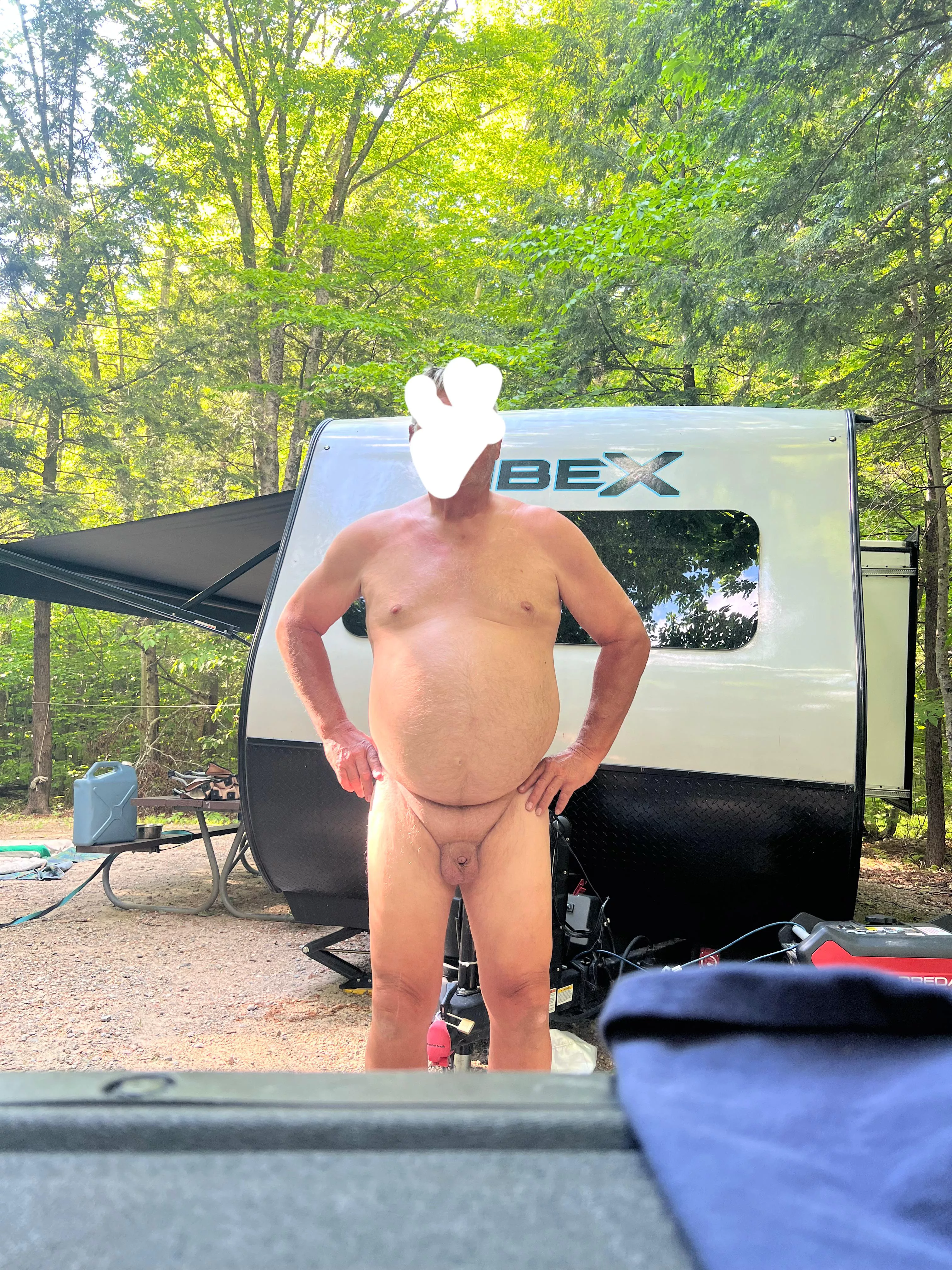 Naked in campsite
