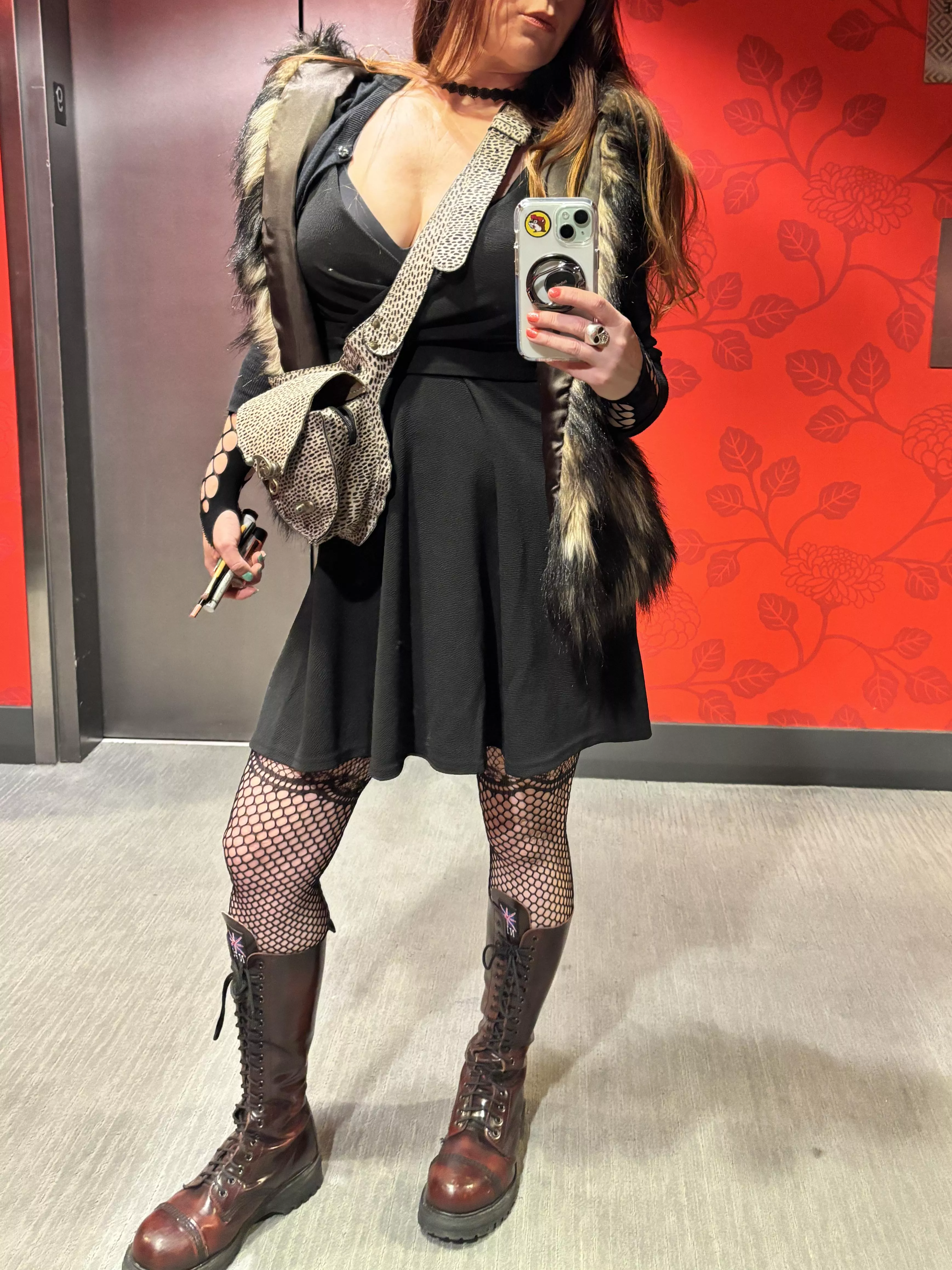 Boots and fishnets make me feel SO sexy. 