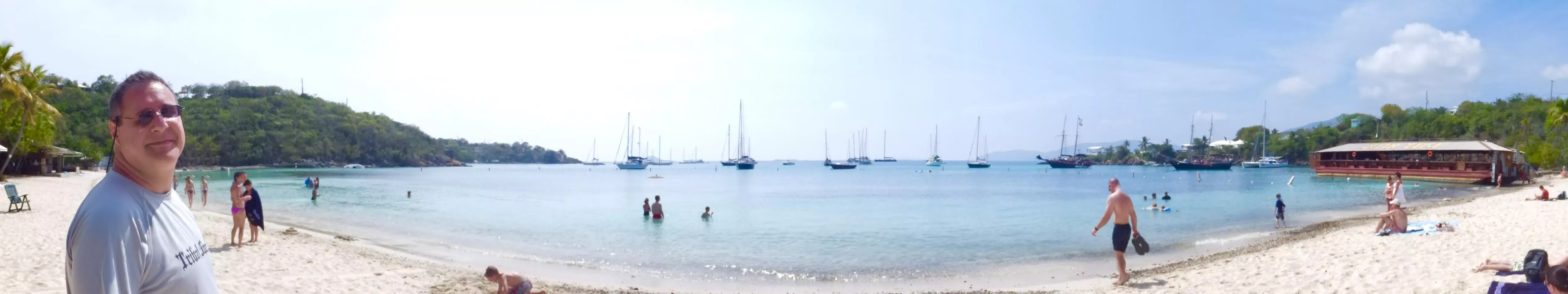 Honeymoon Beach on Druif Bay, Water Island, U.S. Virgin Islands (just south of St. Thomas), flanked by a goofy middle-aged dude and a crazed party-boat