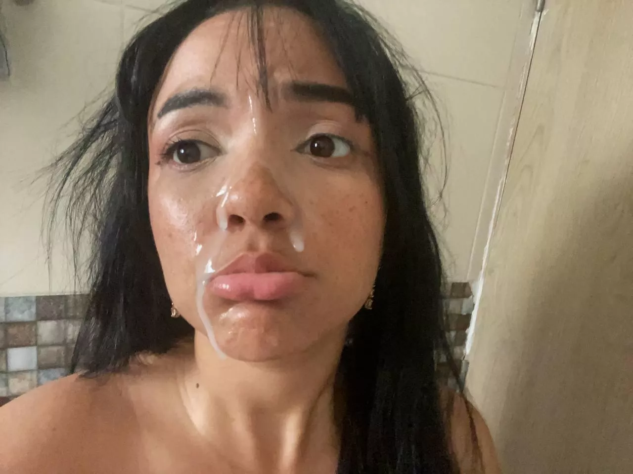 My pretty little slutty face covered in cum again