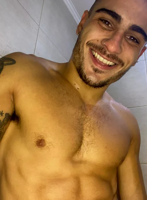 Wanna scrub my back, or my soccer abs first?