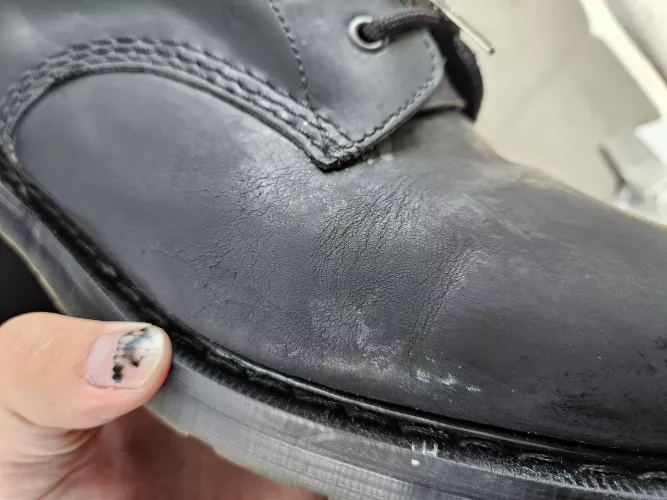 Is texturing like this normal on relatively new greasy leather boots? Or am I doing something wrong care wise?