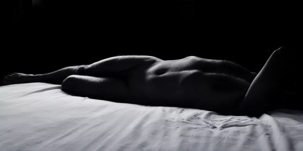 male nude on bed
