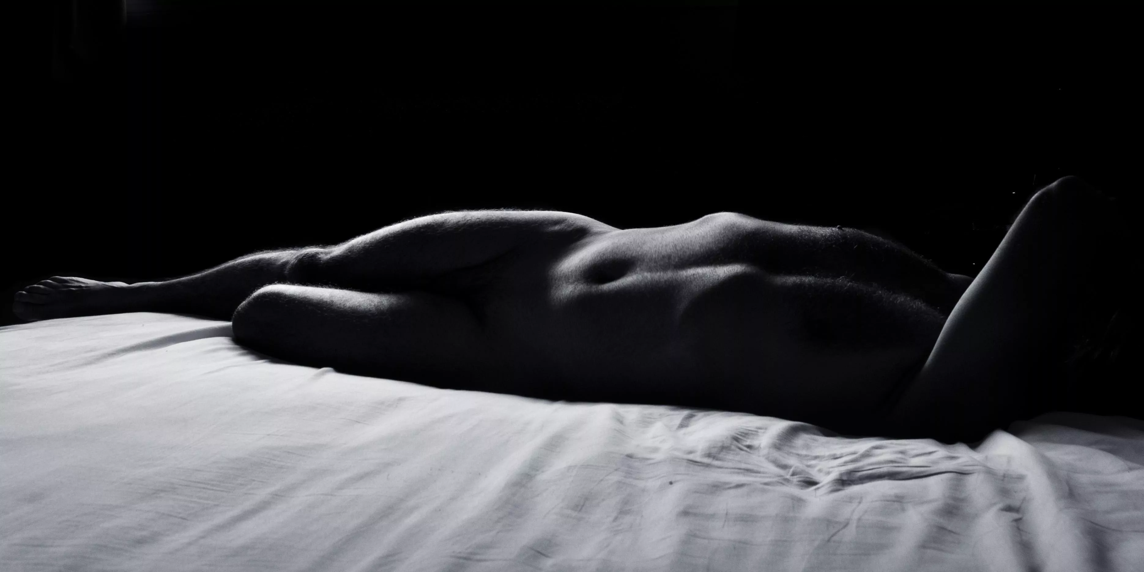 male nude on bed