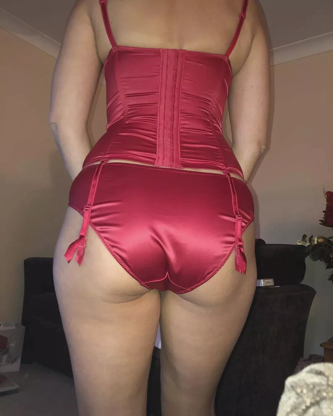 red satin corset and panties