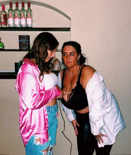 All her friends love playing with her massive tits