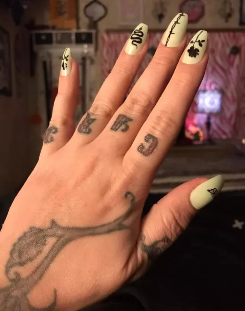 Thoughts on hand tattoos?