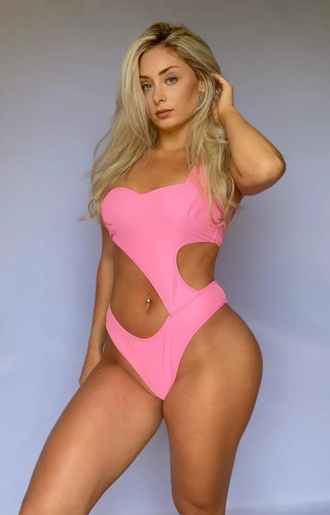 Chloe in a pink cutout Onepiece 