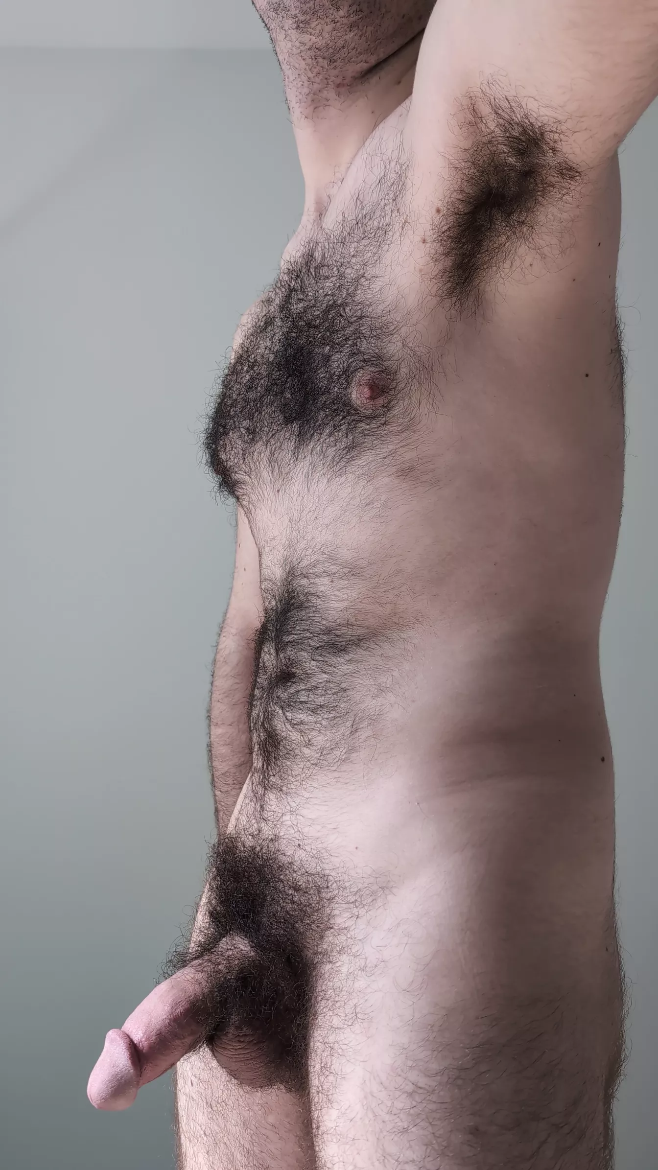 Lifting my arm so you can get a really good view of my armpit hair