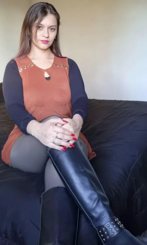 Sitting like a real lady in my boots