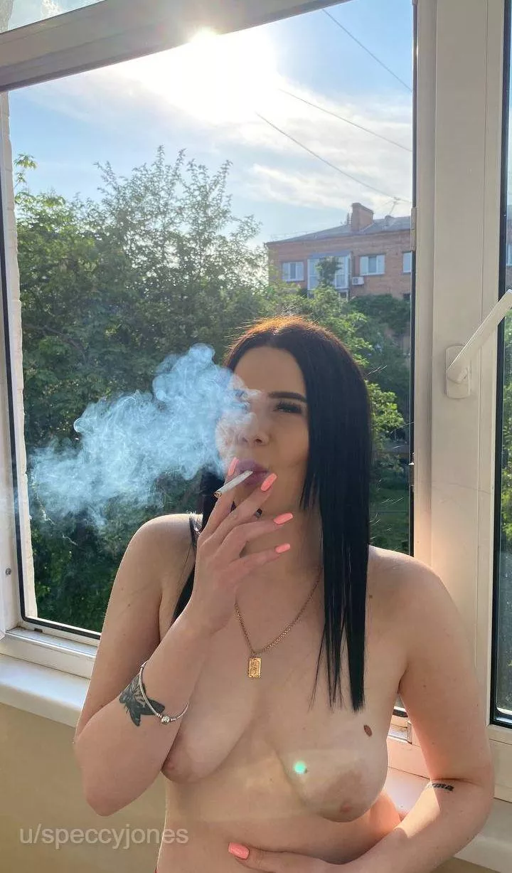 Smoking in front of window