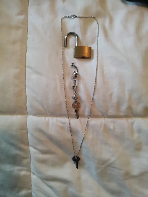 The Lioness told me she felt her current key and necklace felt bulky, so I found a cute lock/key set, a feminine chain, and made a matching belly button ring to complete the set!  Can't wait to surprise her.