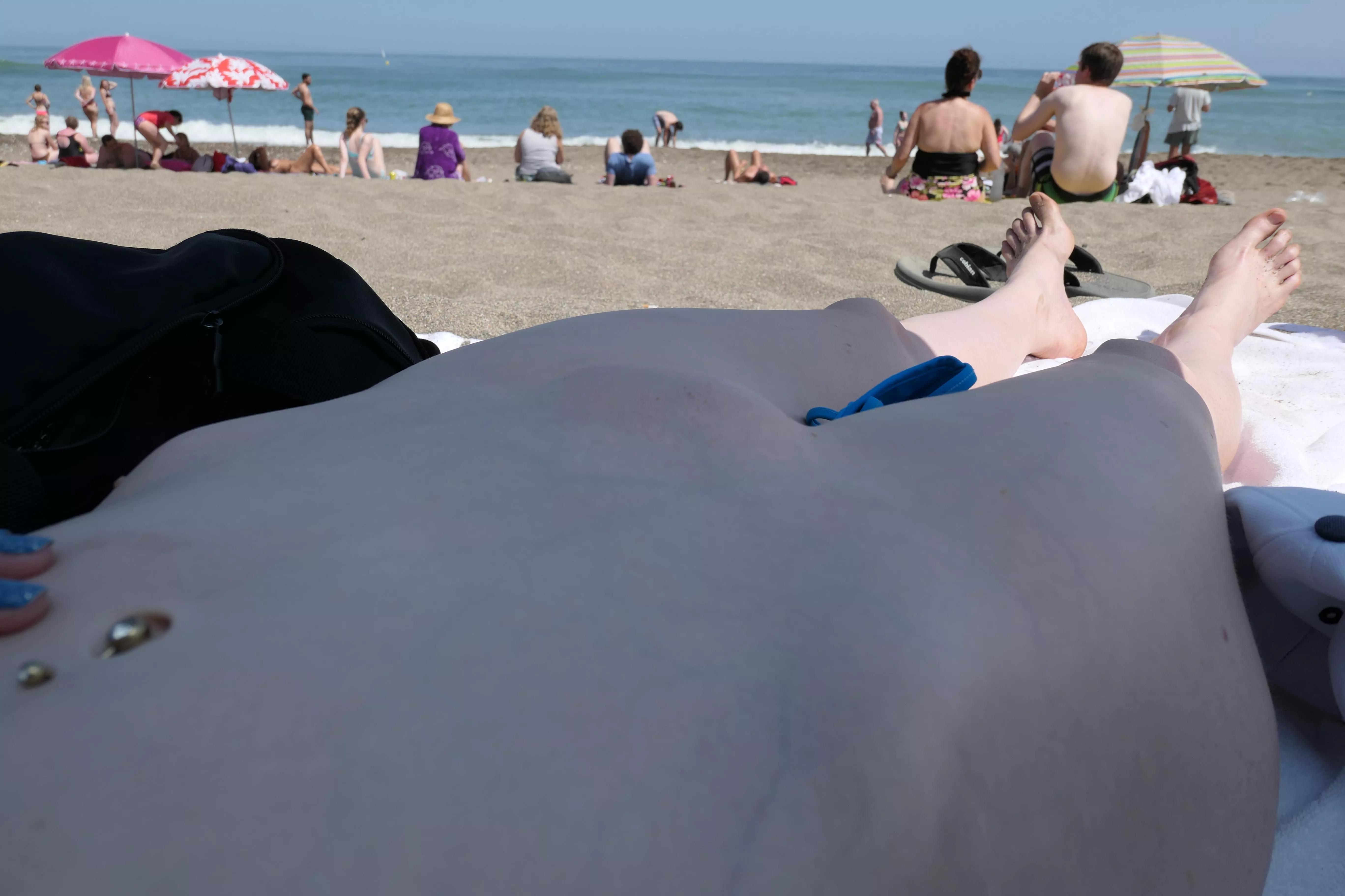 My husband untied the strings of my bottom and exposed my mound