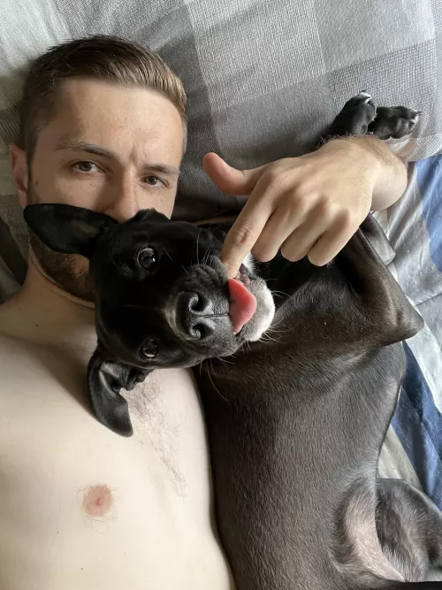 My snuggle buddy just wants to chew on my fingers 😂