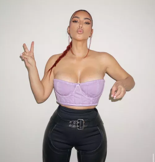 Big kiss and a peace sign 