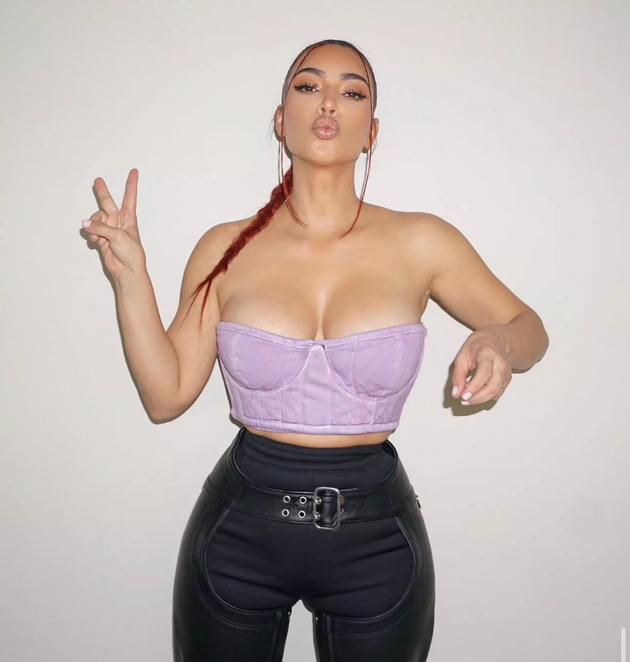 Big kiss and a peace sign 