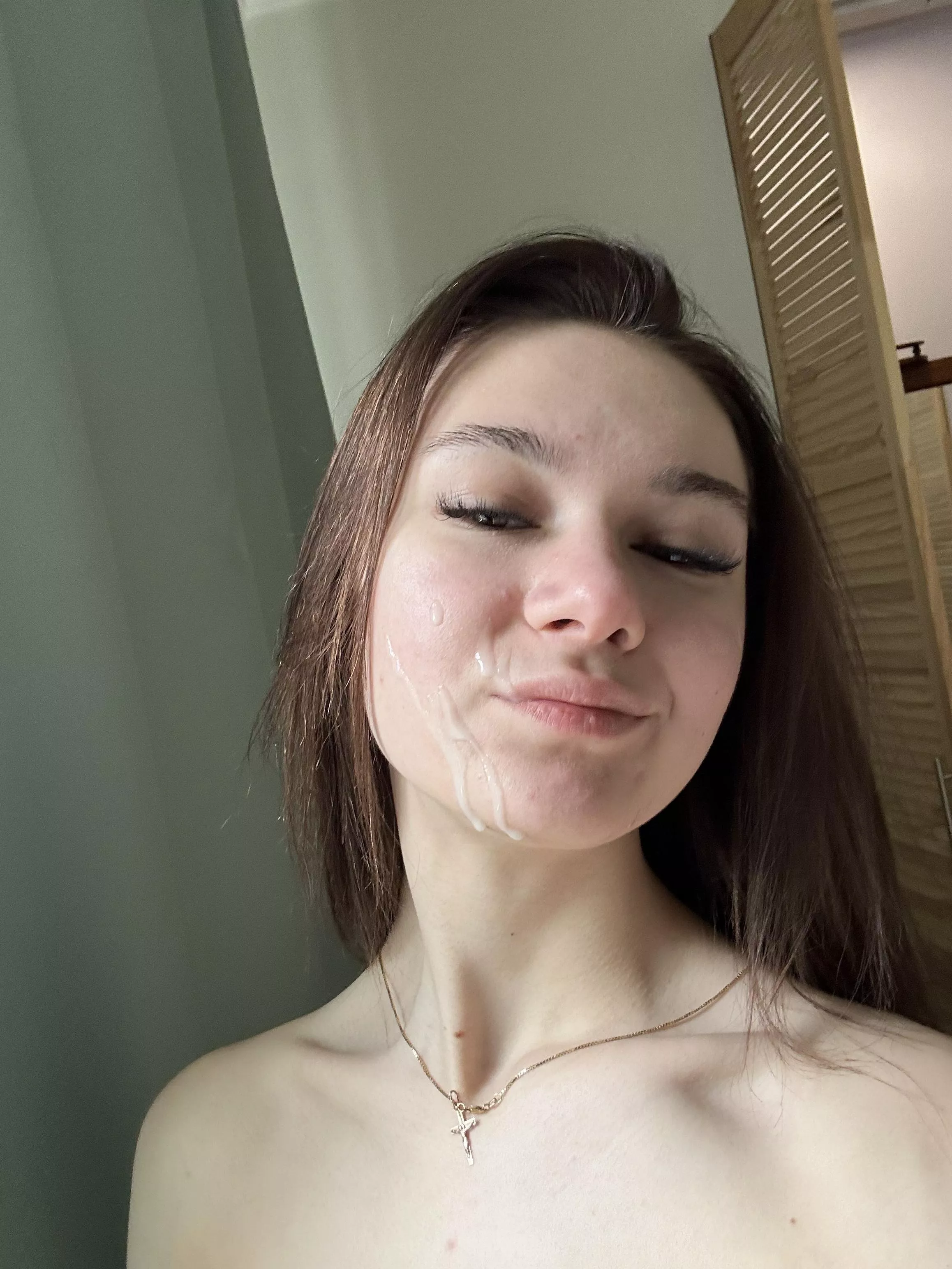 Got cum on her face and is happy