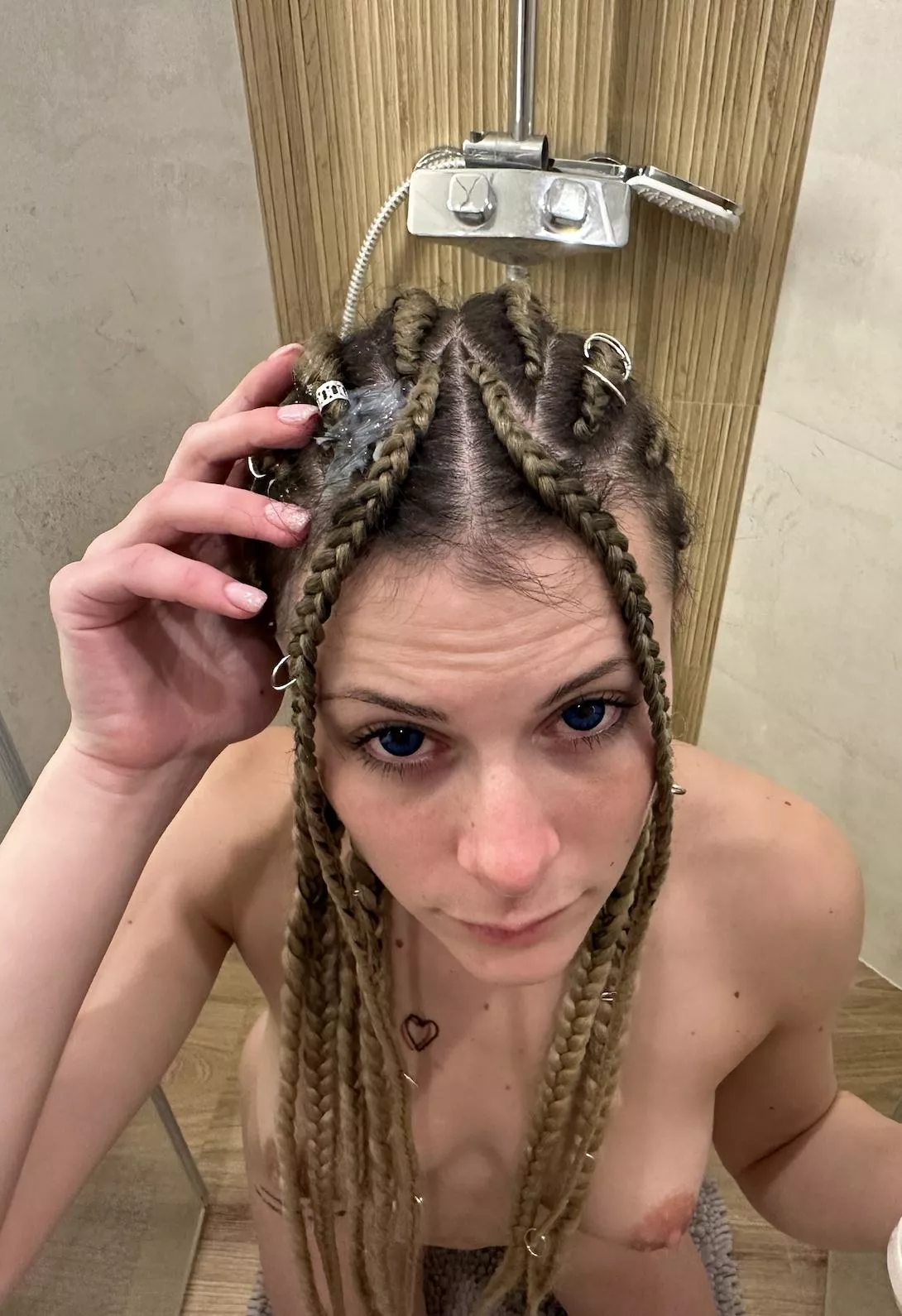 admiring myself through my cell phone camera