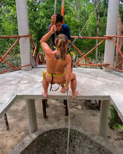 Rappelling down to the Cenote - Nude Tulum Tour