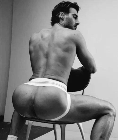Seated in jockstrap 