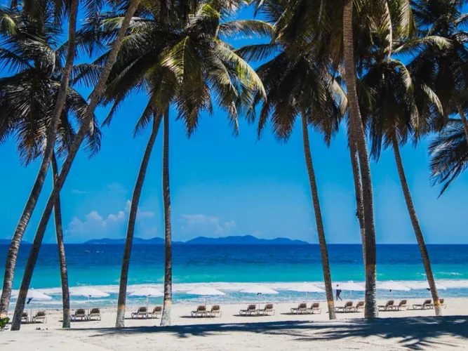 This beautiful paradise is called Playa El Agua in Venezuela.