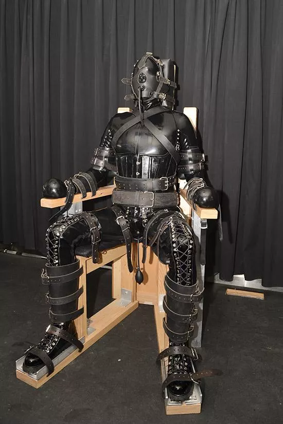 The Hacker awaiting questioning.