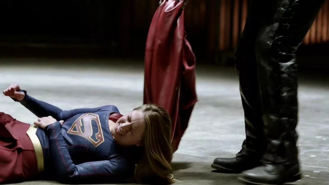 Poor Supergirl. Dragged by her cape