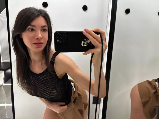 Trying on a sexy skirt in the store for you