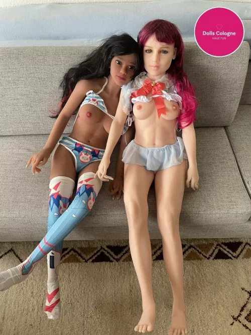 2 Dolls showing titts