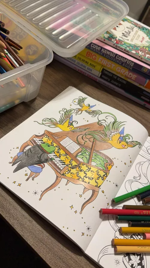 I did some coloring while watching movies with Daddi! 🖍️💚 We watched Trolls 3 and Sing 2! 🍿