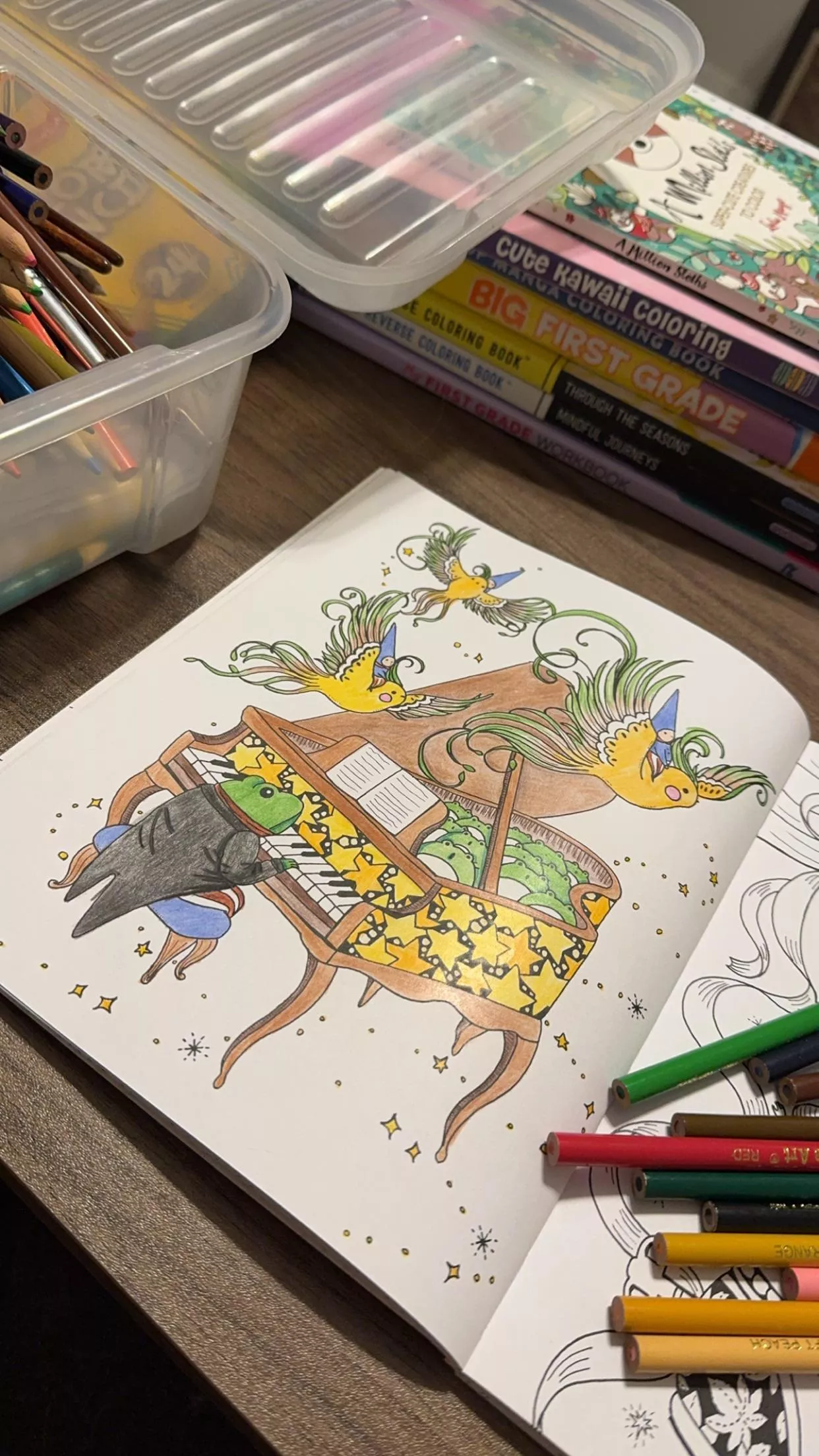 I did some coloring while watching movies with Daddi! 🖍️💚 We watched Trolls 3 and Sing 2! 🍿