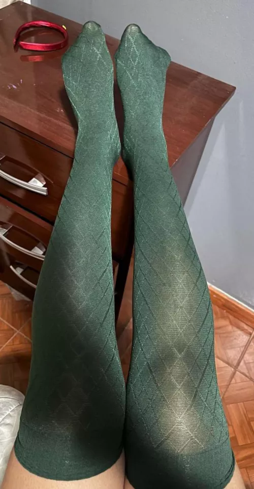 Enjoy my green stockings. Would you leave them on or would you peel them off?