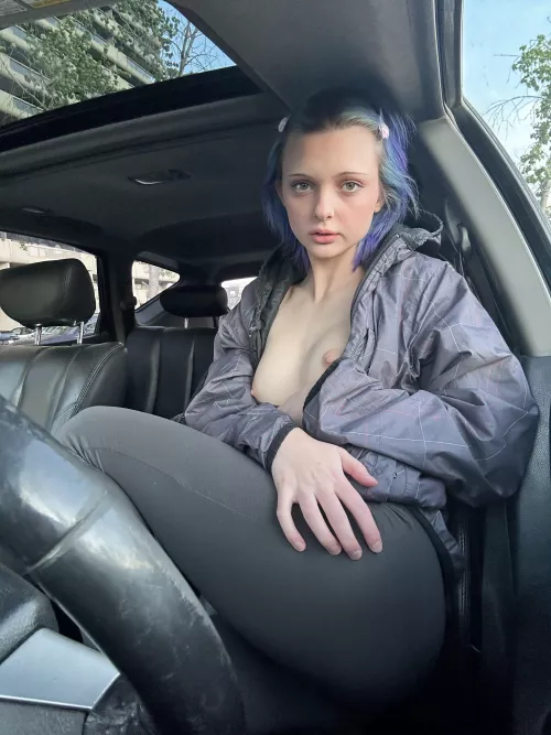Sitting in the car, I decided to show my boobs