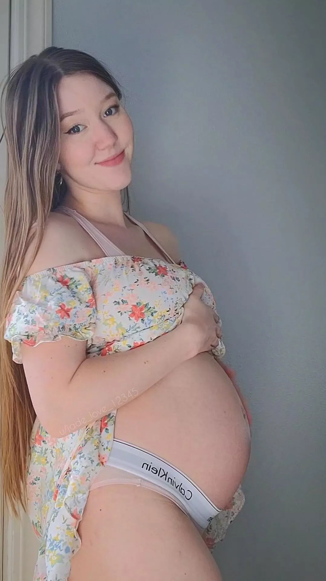 Just a little peek under my dress at my pregnant belly 