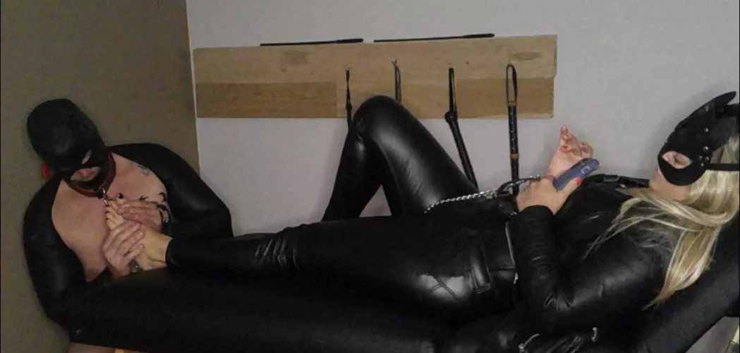 This is my slaves nightly routine. Locked in chastity with his cock drooling out of the cage while he diligently massages for a chance at release.  Does he deserve it? [oc] 