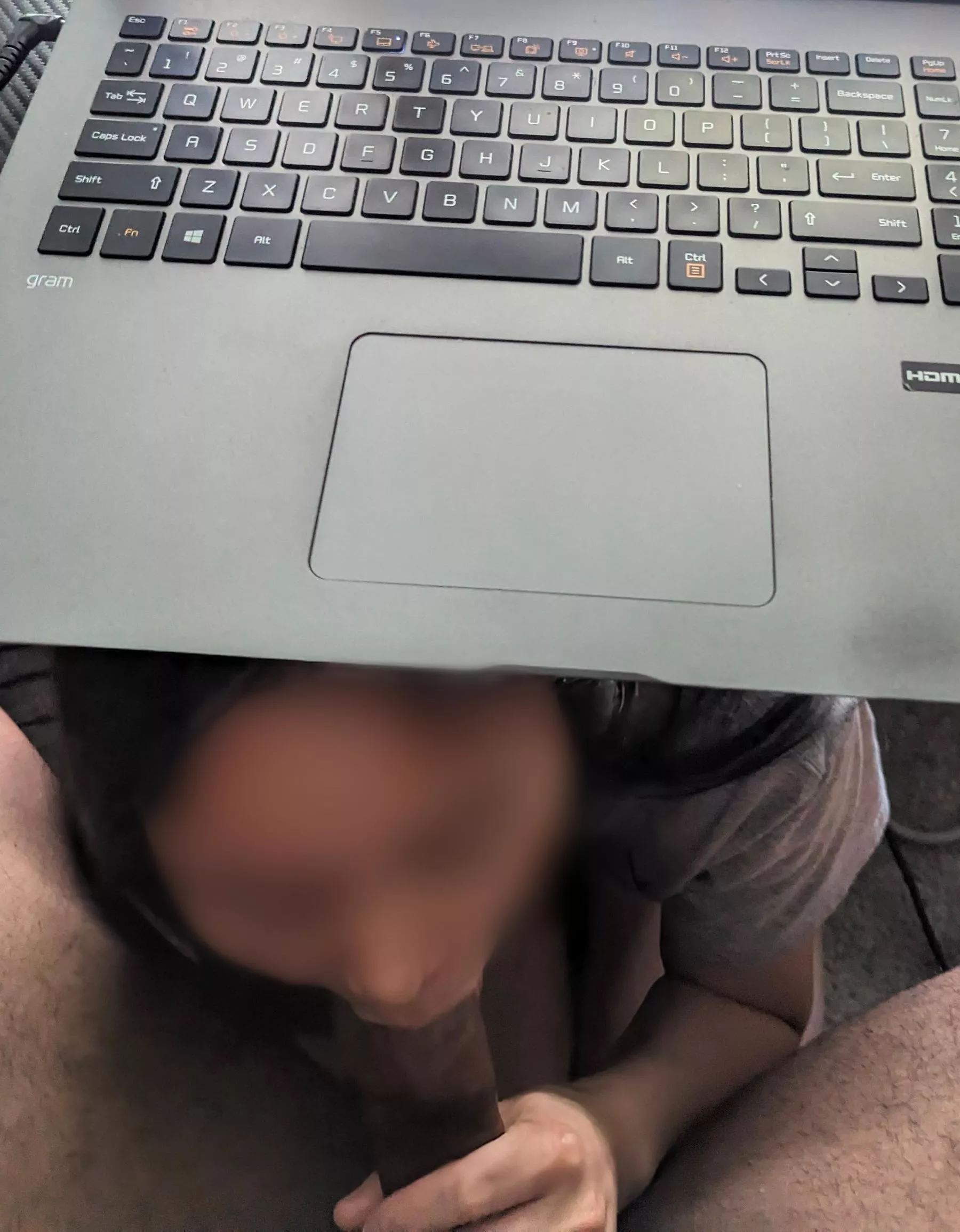 A good slut supports her man under the desk 