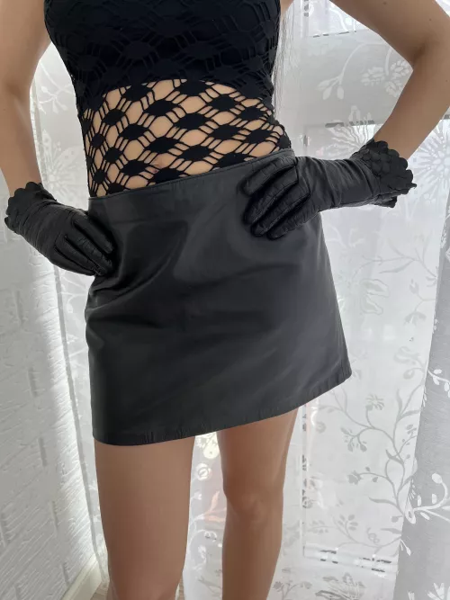 Leather gloves look great on a leather skirt