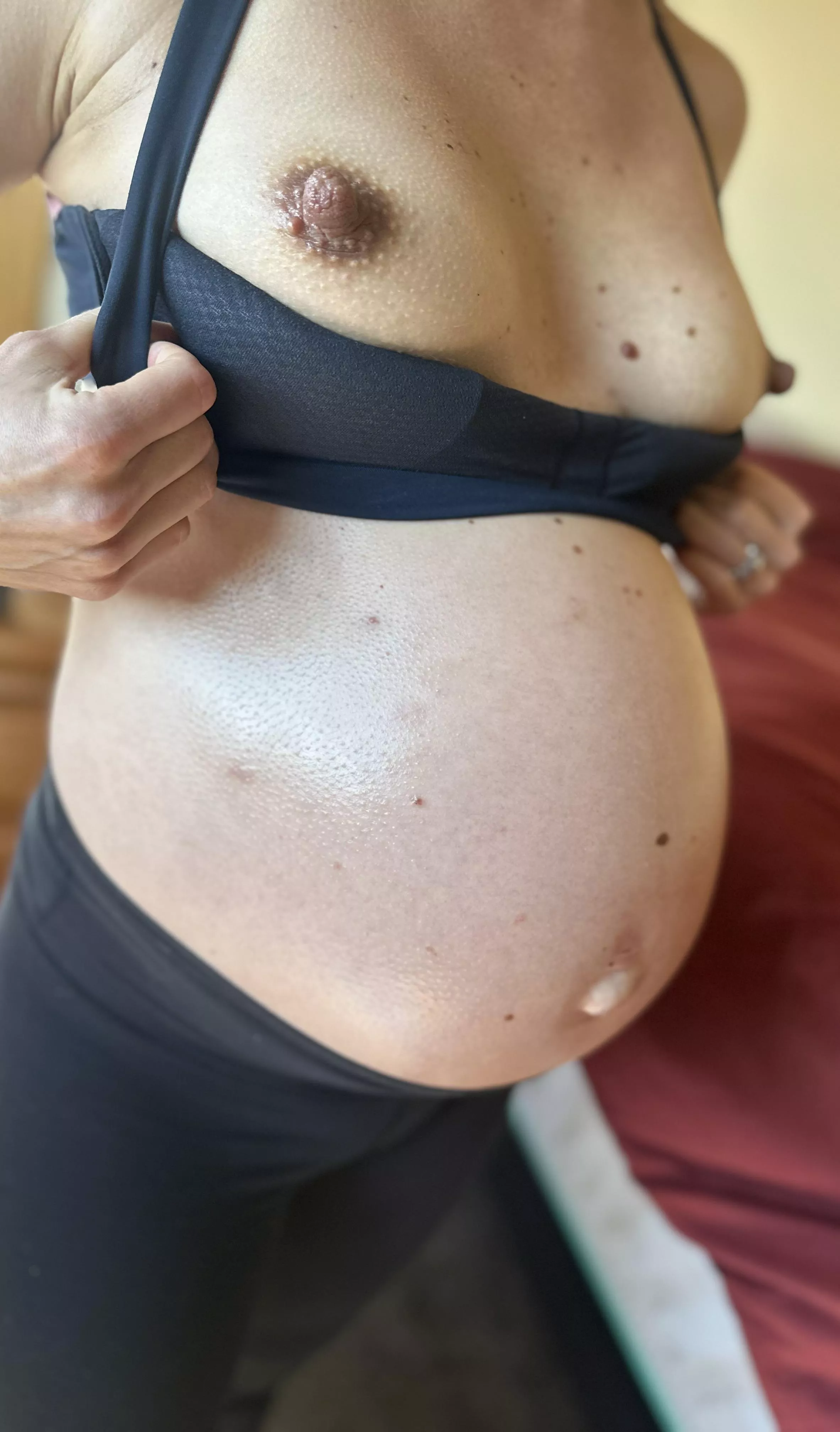 When the bump sticks out further than your tits. 