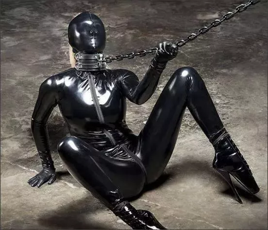 Blonde in Latex and Chained