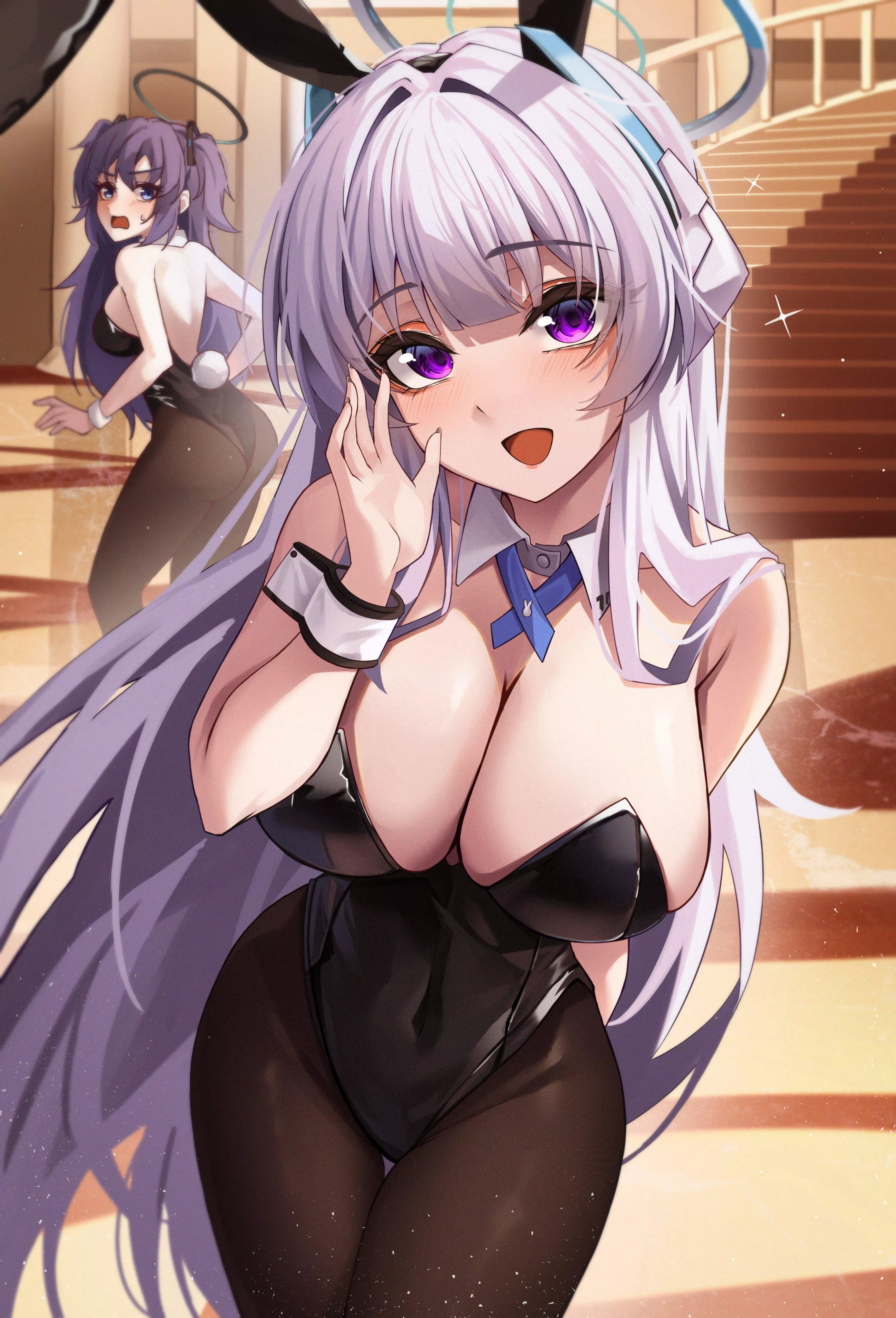 Noa whispering something