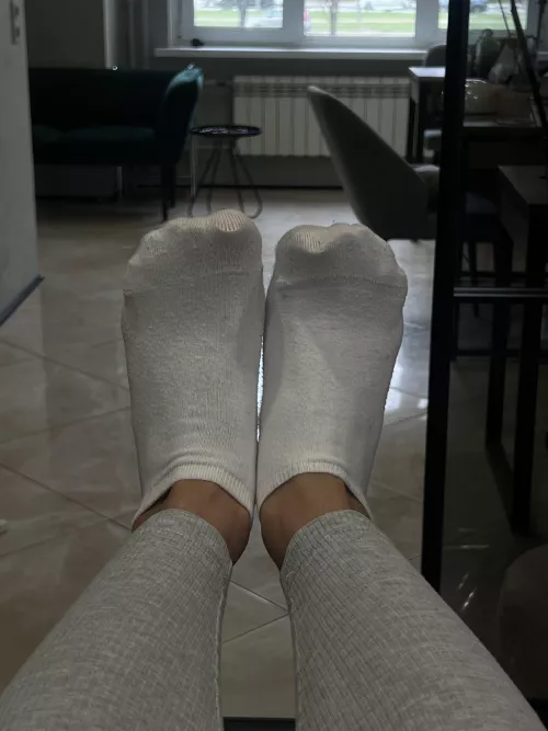 White toes out of fuzzy socks