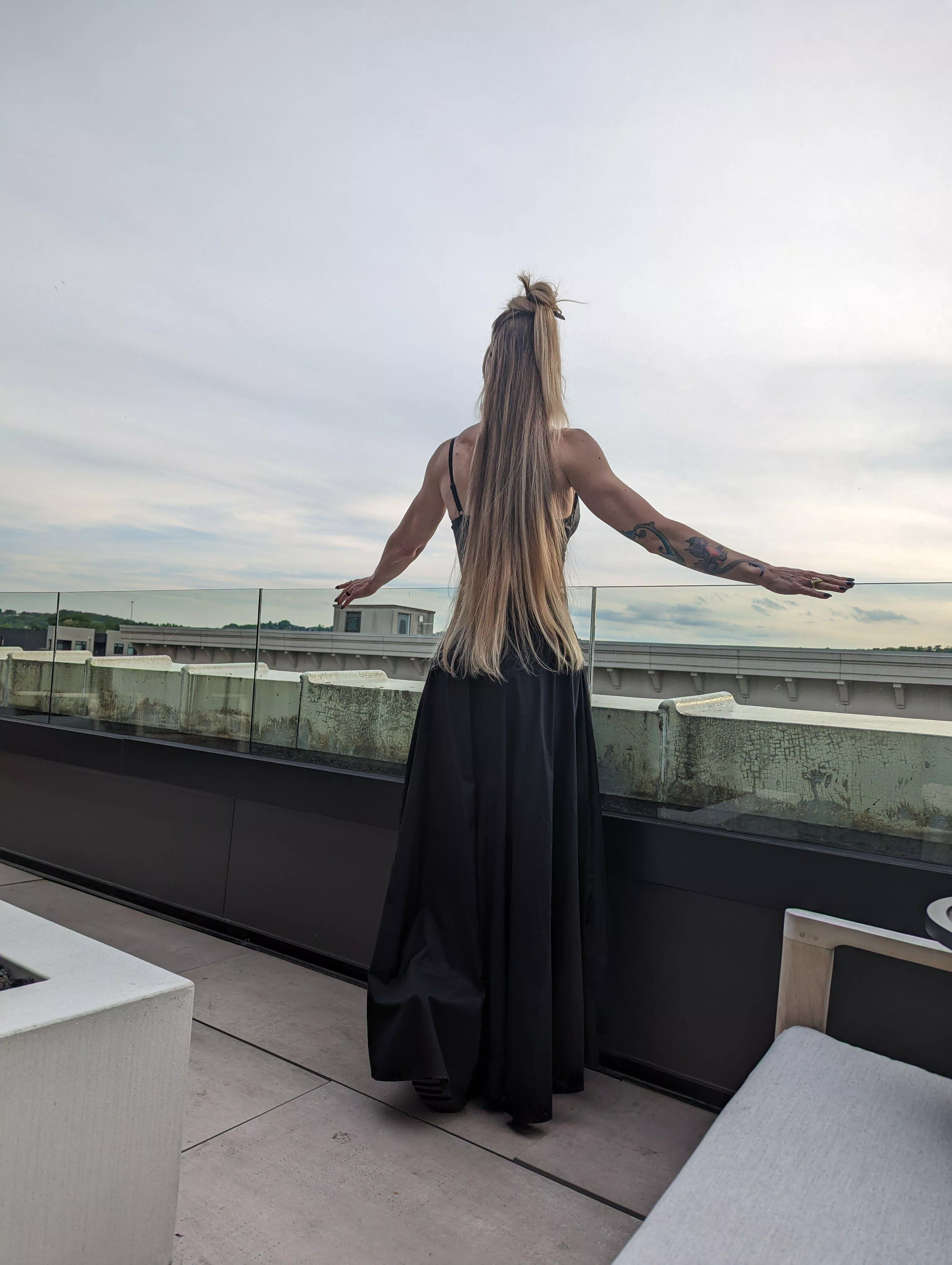 Long blonde hair in a long black skirt. That sounds like the beginning of a gothic country ballad.